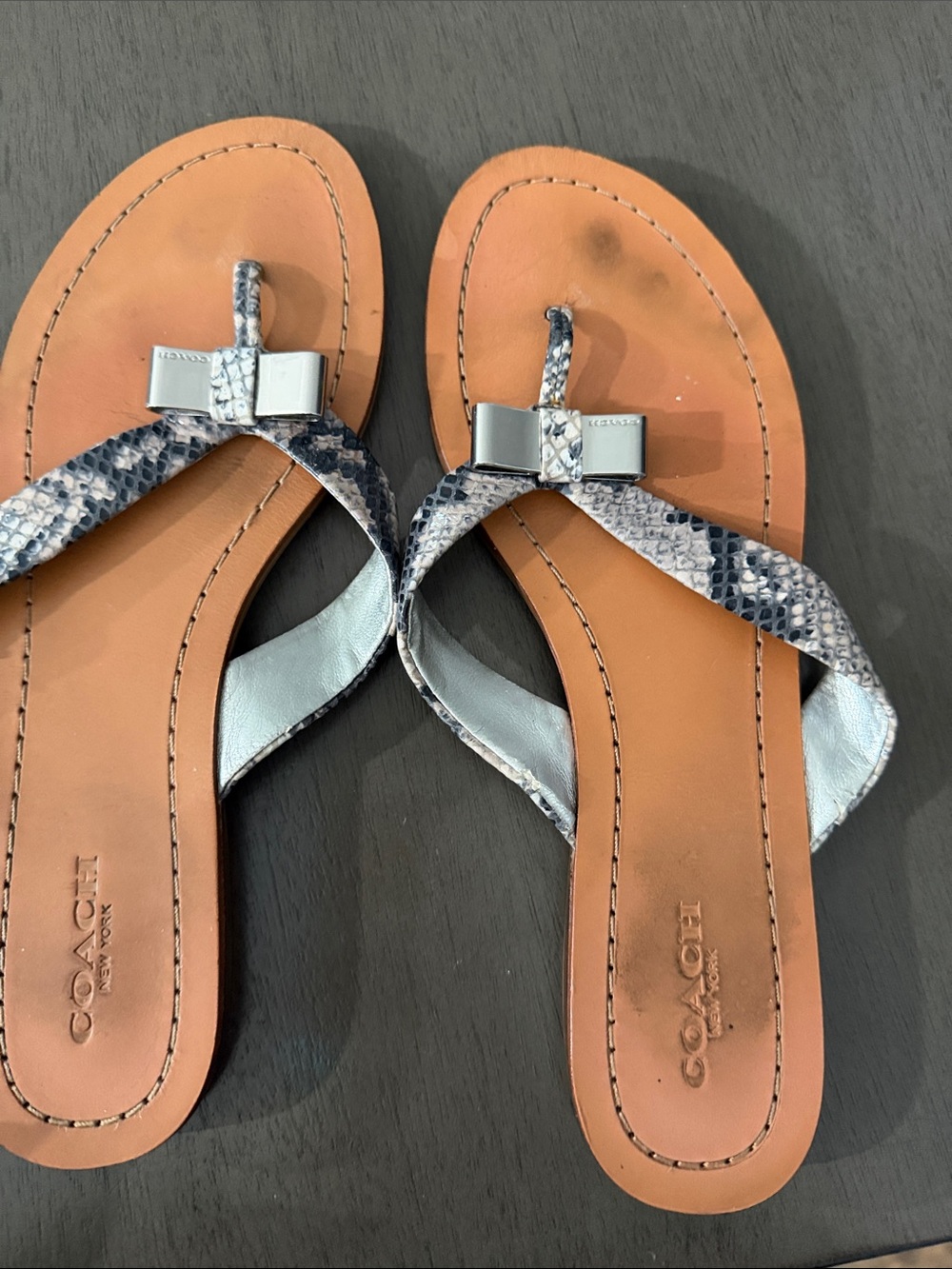 Coach Tan Leather Thong Sandals with Snake-Print Straps and Silver Bows
